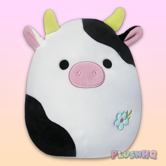 Squishmallows 8-Inch Connor the Cow with Flower