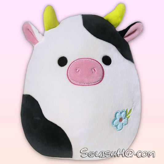 Squishmallows 8-Inch Connor the Cow with Flower